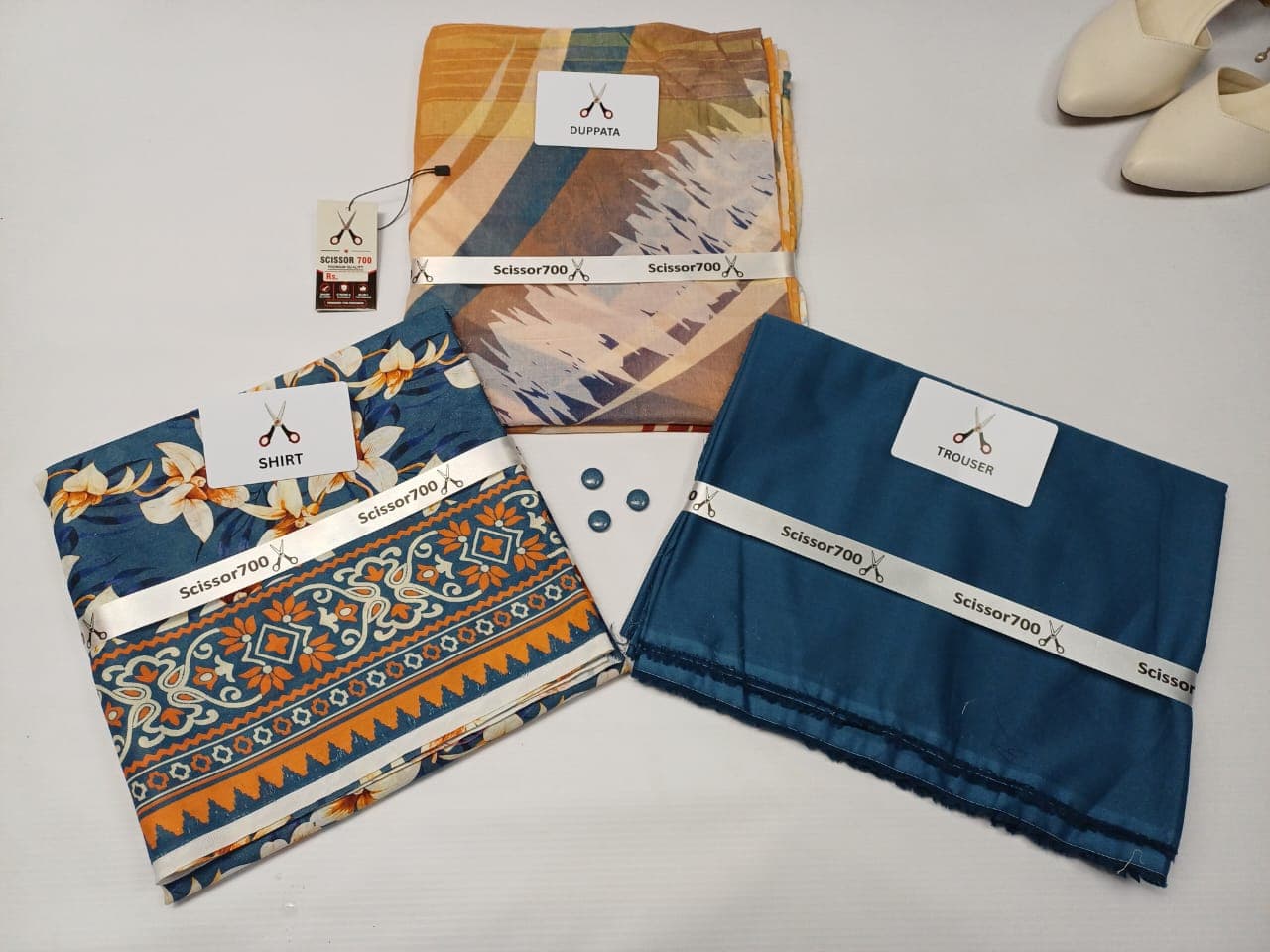Teal Lily three piece unstitched lawn suit — shirt, dupatta and trouser